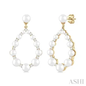 1/4 Ctw Tear Drop 2 MM-4.5 MM Cultured Pearls and Round Cut Diamond Fashion Earring in 14K Yellow Gold